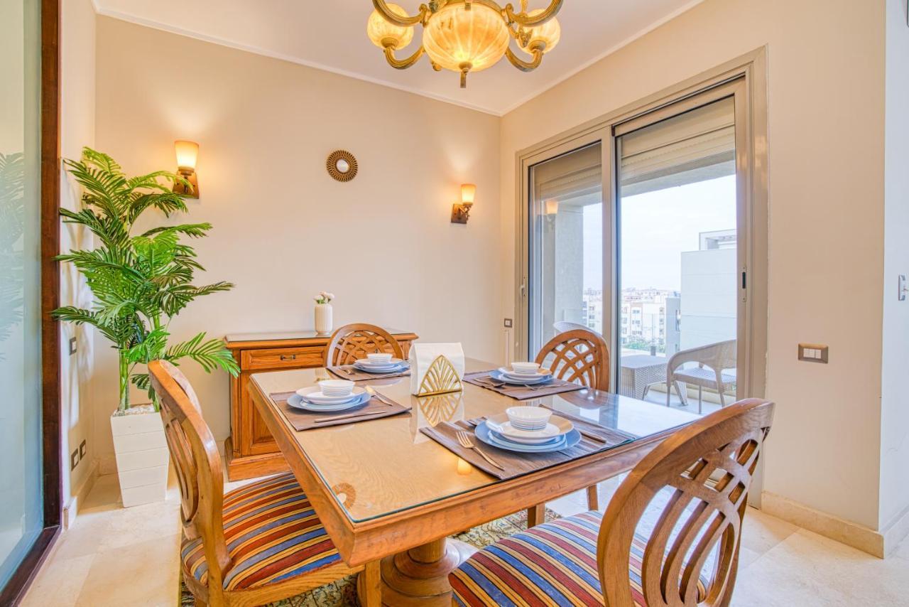 The Suites Near Auc By Elegant Kairo Bagian luar foto