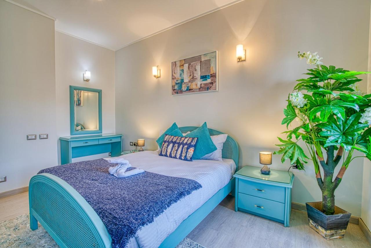 The Suites Near Auc By Elegant Kairo Bagian luar foto