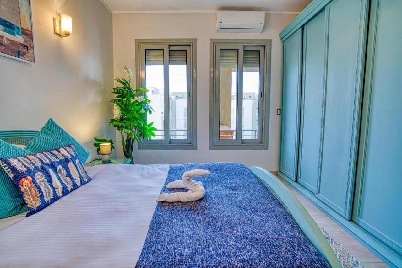 The Suites Near Auc By Elegant Kairo Bagian luar foto