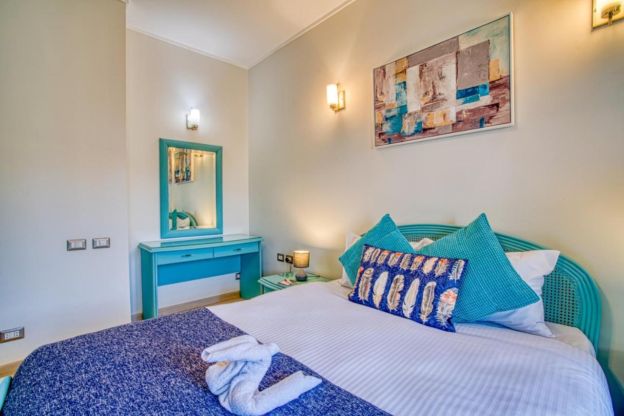 The Suites Near Auc By Elegant Kairo Bagian luar foto
