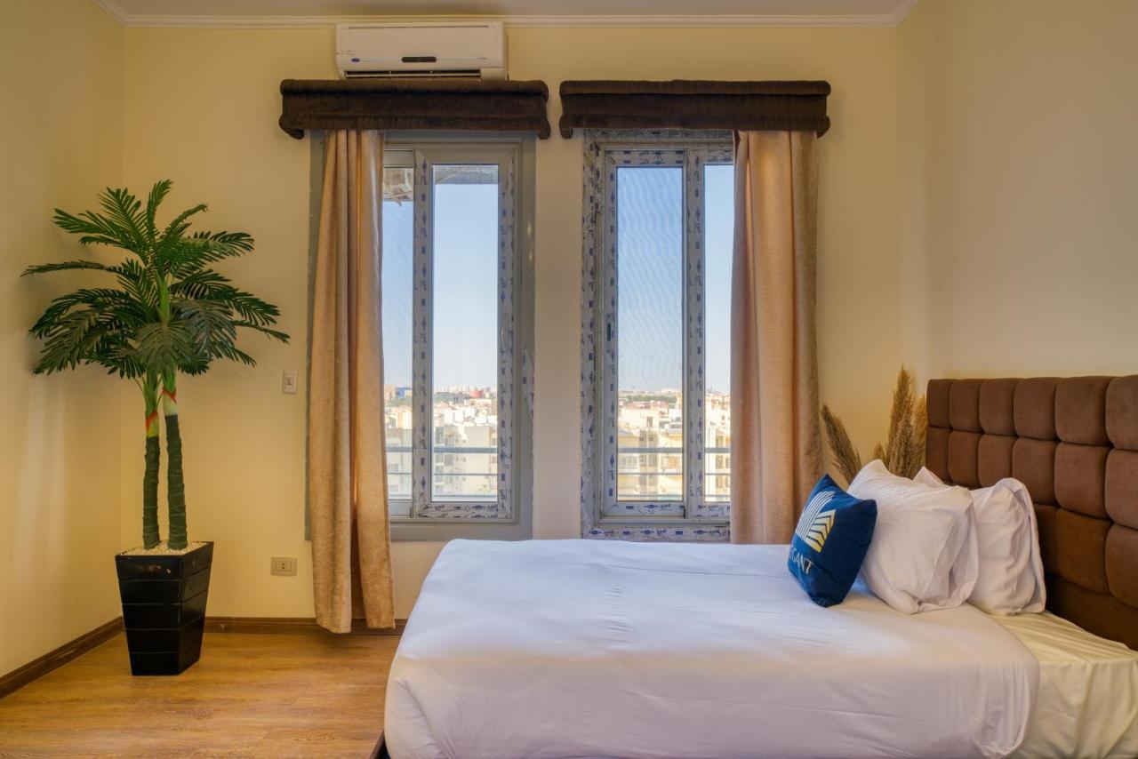 The Suites Near Auc By Elegant Kairo Bagian luar foto