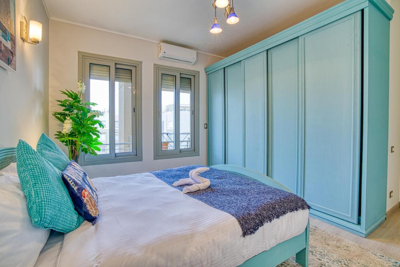 The Suites Near Auc By Elegant Kairo Bagian luar foto