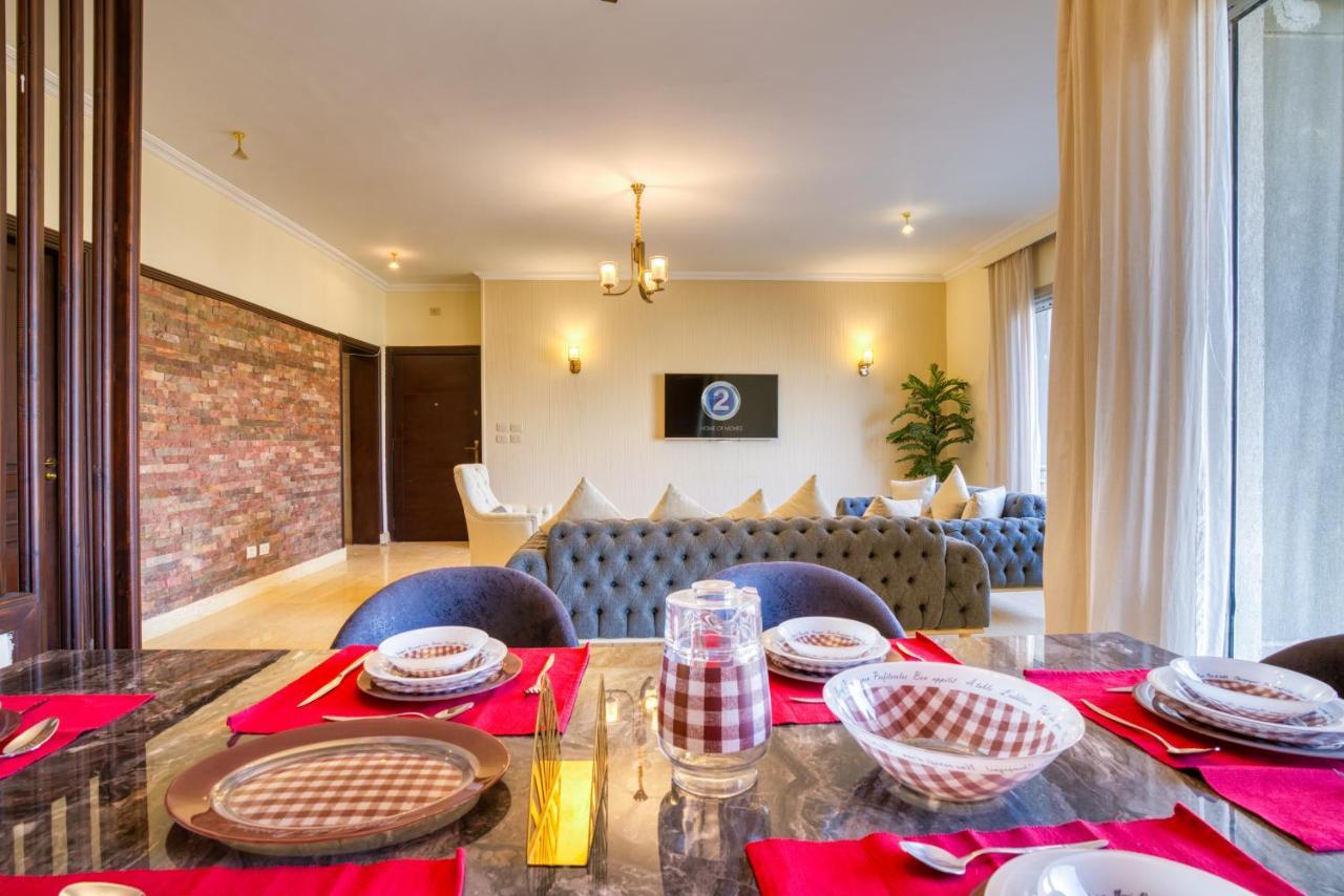 The Suites Near Auc By Elegant Kairo Bagian luar foto
