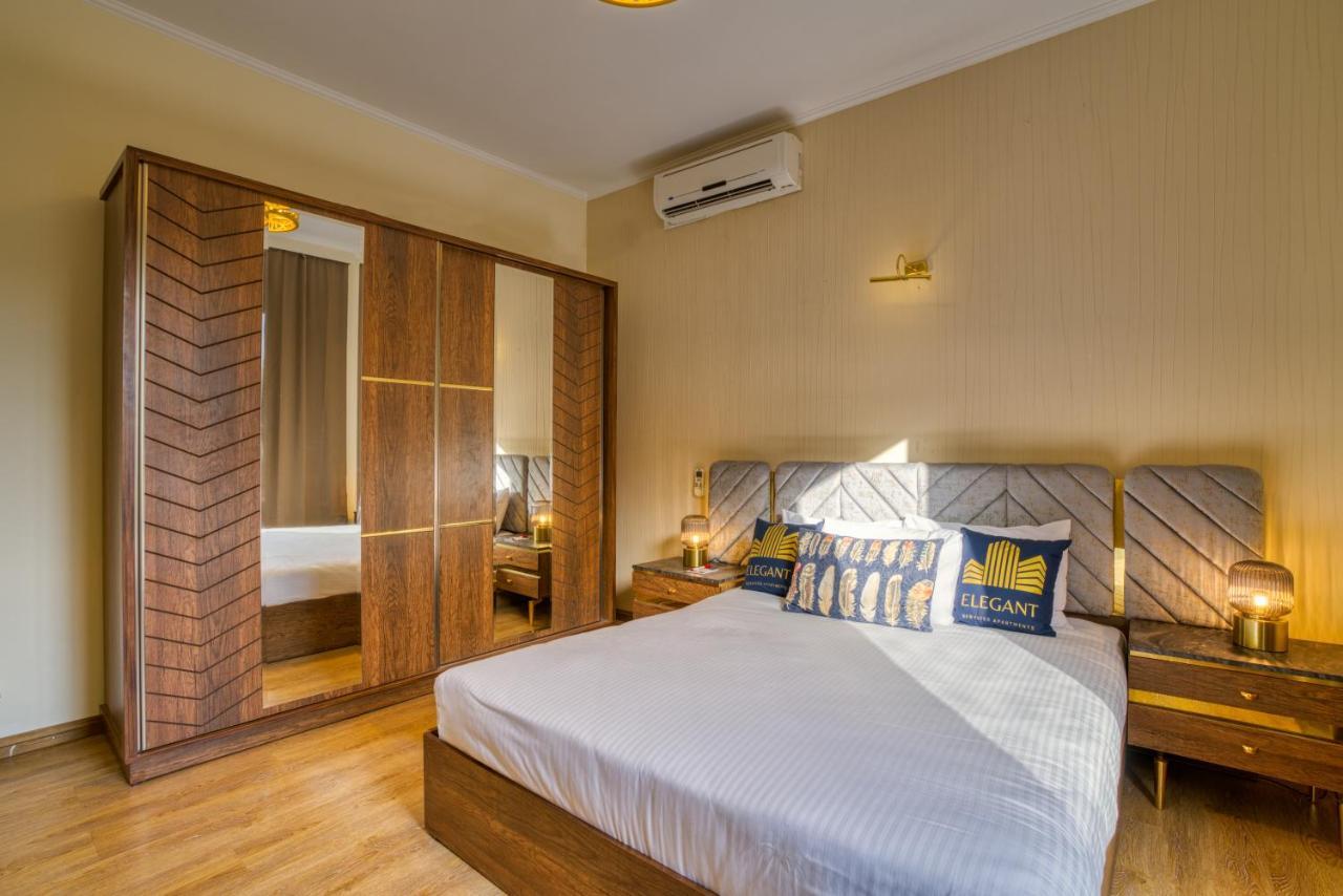 The Suites Near Auc By Elegant Kairo Bagian luar foto
