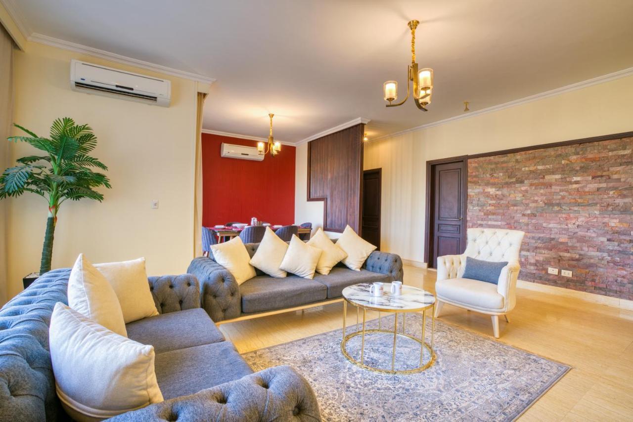 The Suites Near Auc By Elegant Kairo Bagian luar foto