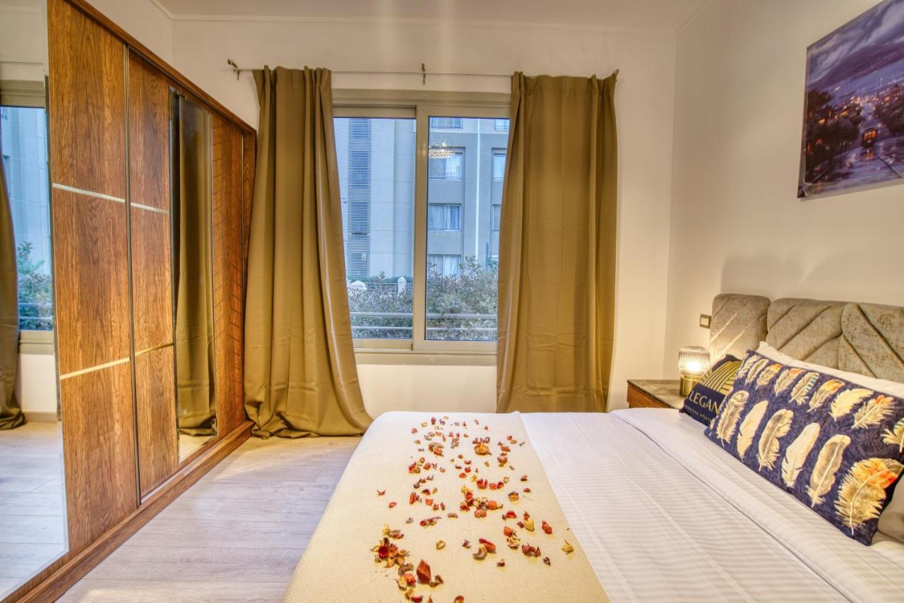 The Suites Near Auc By Elegant Kairo Bagian luar foto