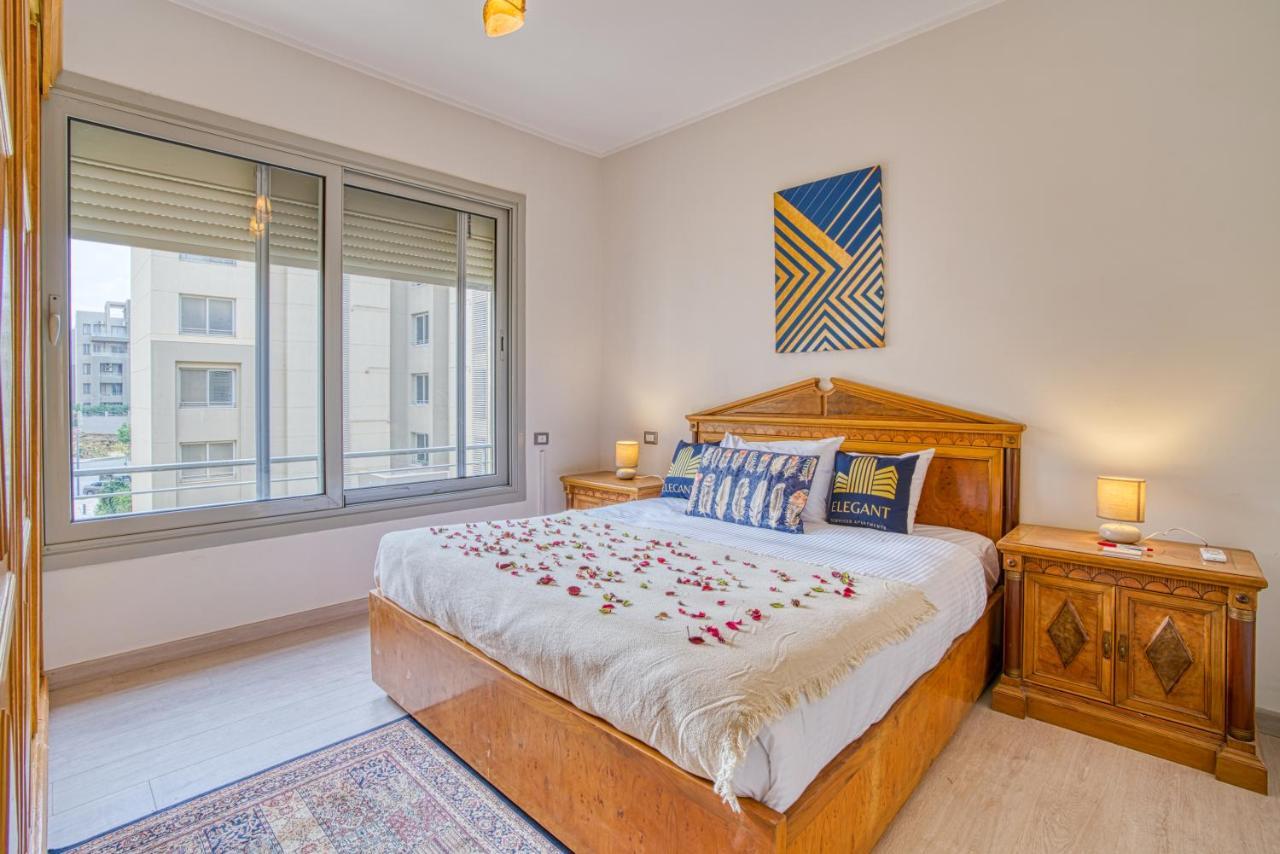 The Suites Near Auc By Elegant Kairo Bagian luar foto