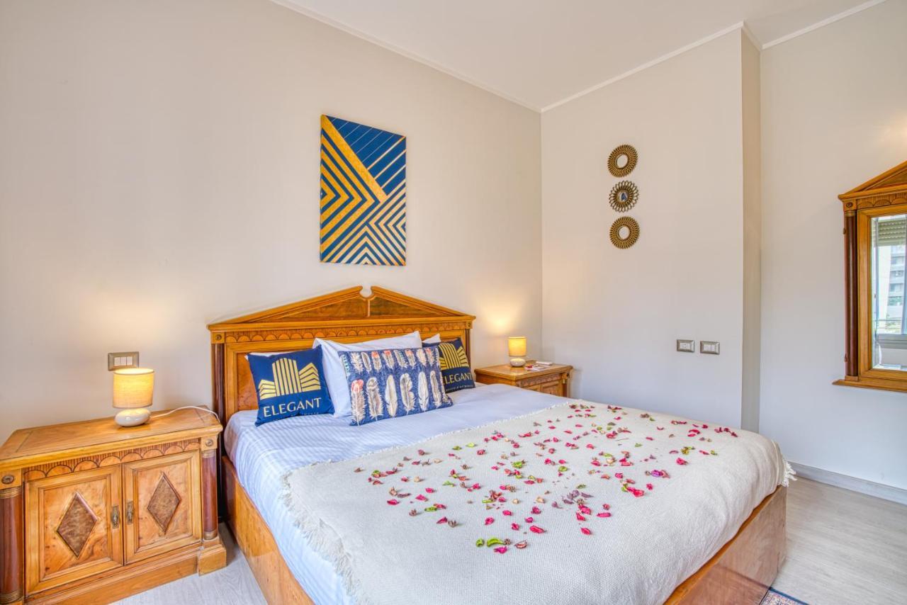 The Suites Near Auc By Elegant Kairo Bagian luar foto