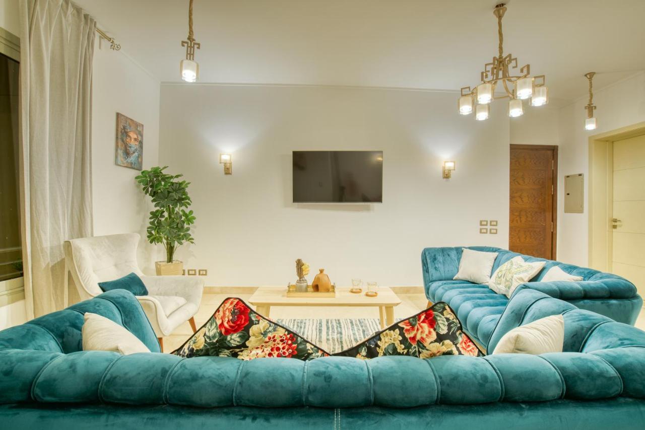 The Suites Near Auc By Elegant Kairo Bagian luar foto