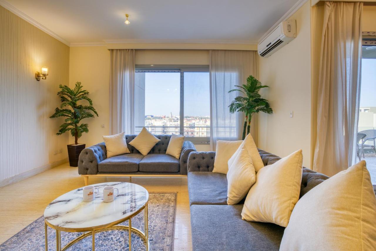 The Suites Near Auc By Elegant Kairo Bagian luar foto