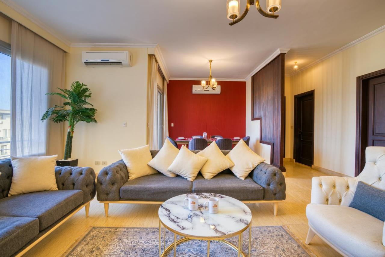 The Suites Near Auc By Elegant Kairo Bagian luar foto