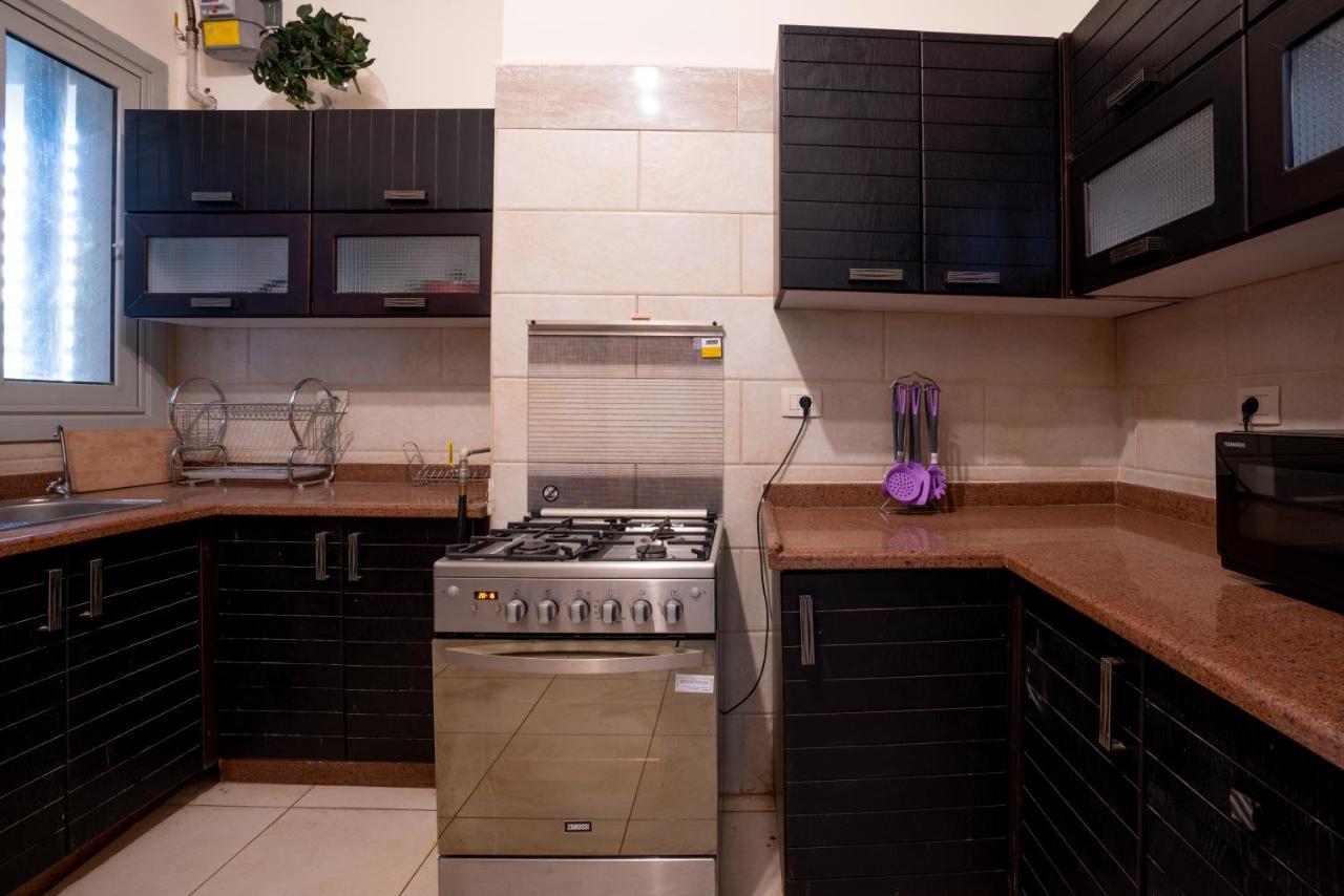 The Suites Near Auc By Elegant Kairo Bagian luar foto