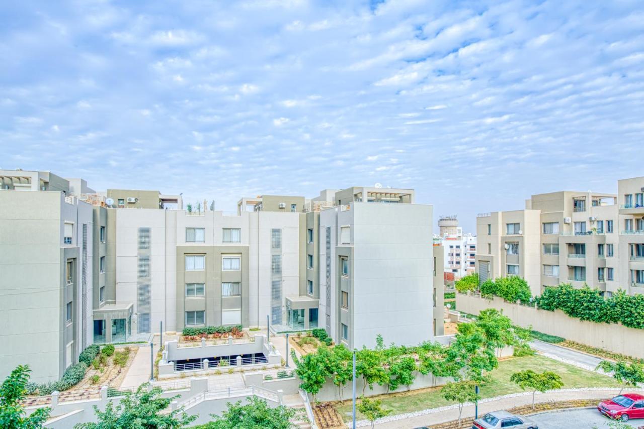 The Suites Near Auc By Elegant Kairo Bagian luar foto