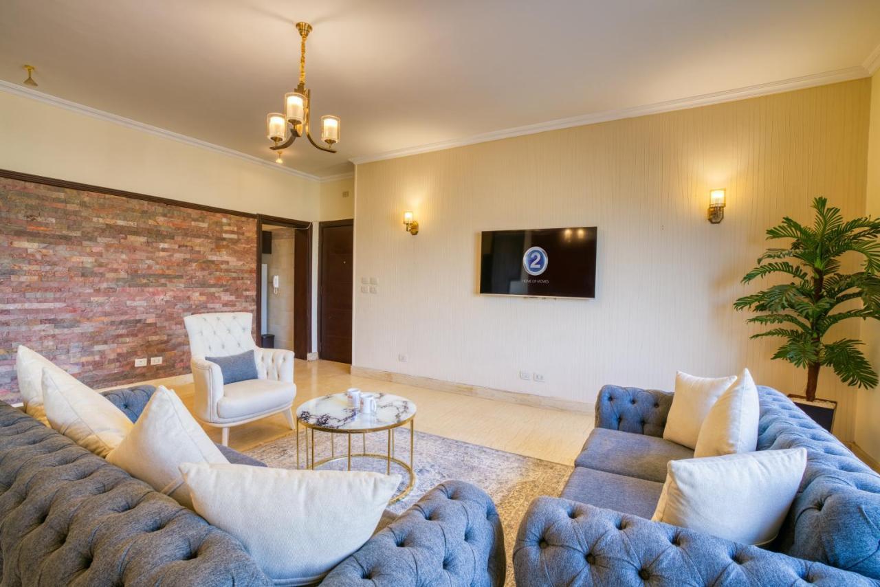 The Suites Near Auc By Elegant Kairo Bagian luar foto