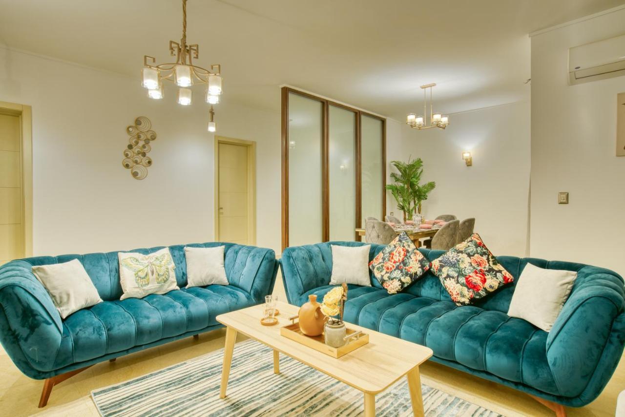 The Suites Near Auc By Elegant Kairo Bagian luar foto