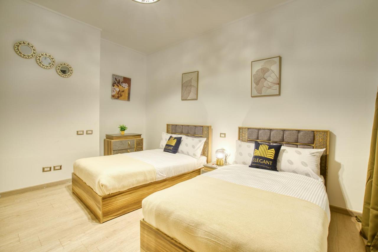 The Suites Near Auc By Elegant Kairo Bagian luar foto