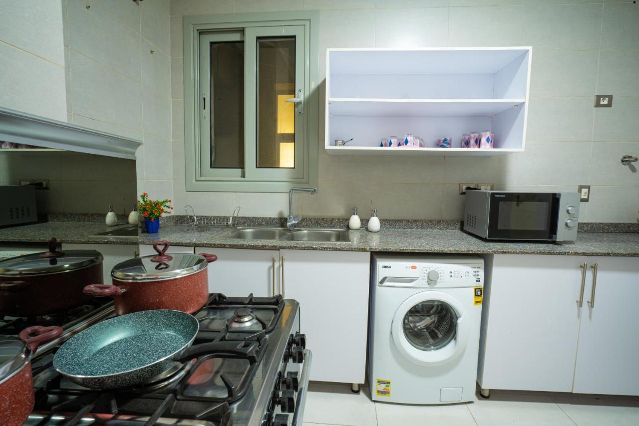 The Suites Near Auc By Elegant Kairo Bagian luar foto