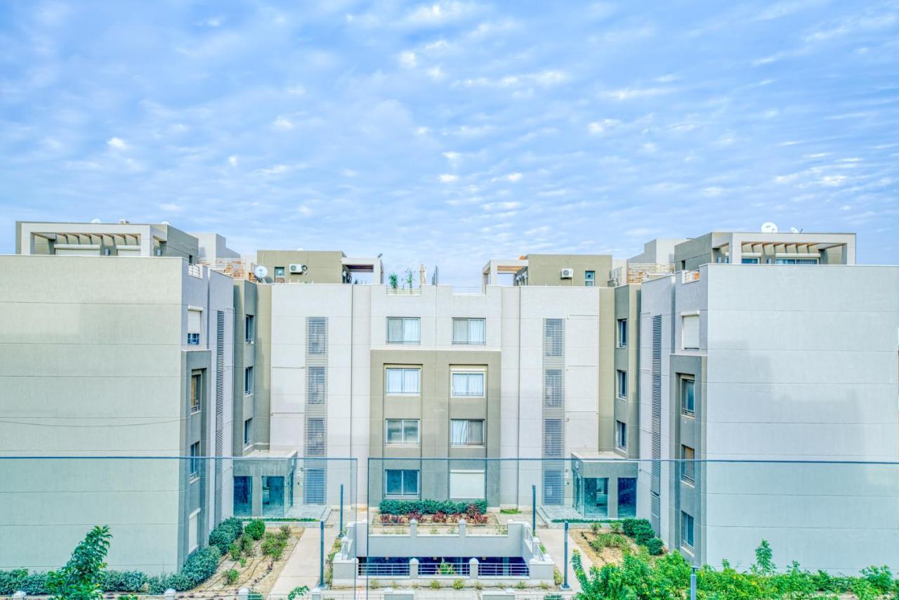 The Suites Near Auc By Elegant Kairo Bagian luar foto