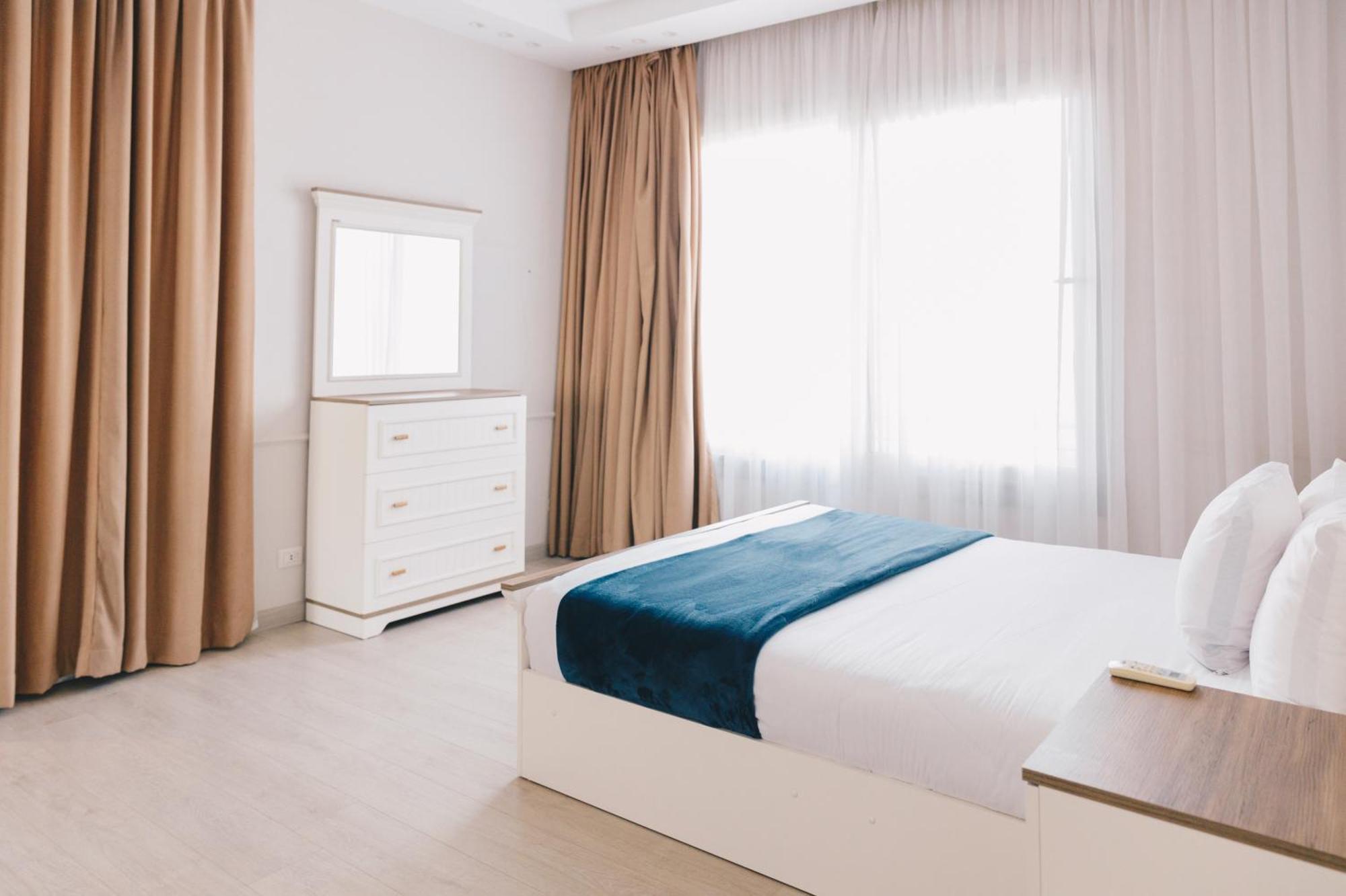The Suites Near Auc By Elegant Kairo Bagian luar foto
