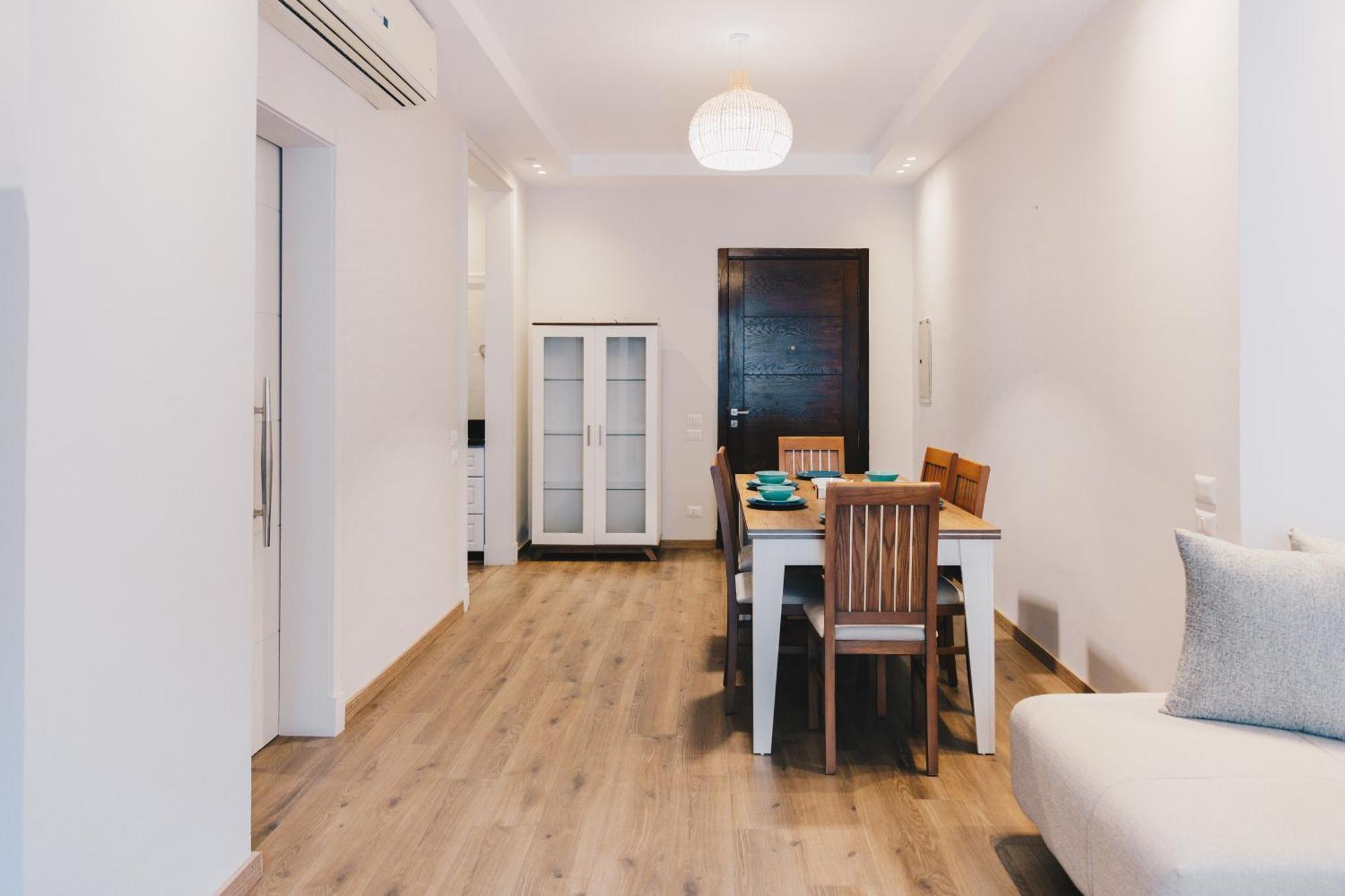 The Suites Near Auc By Elegant Kairo Bagian luar foto